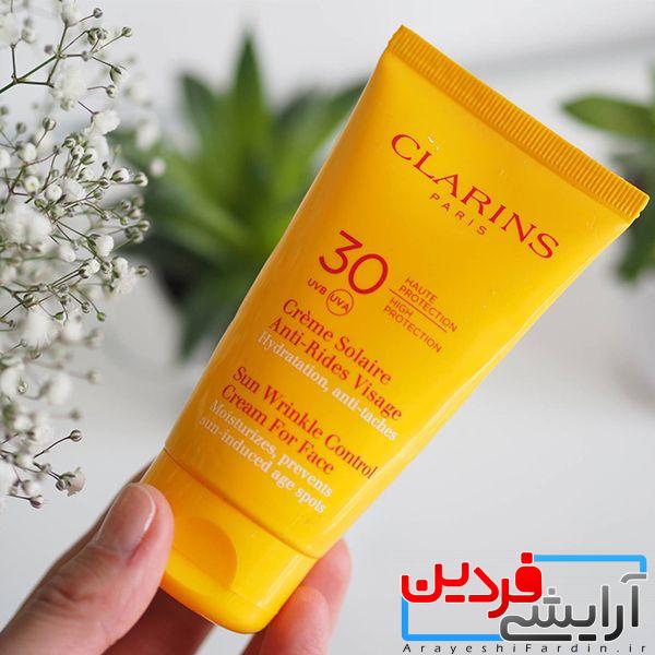 8f9a558c7a792fd1a0465c6e110f7f07c62227f0d9c1dc90fc58c422b5e979df ضد آفتاب رنگی کلارنس CLARINS SPF30 - Image 3